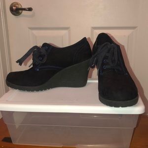 Black laced ankle boots with Wedged heel